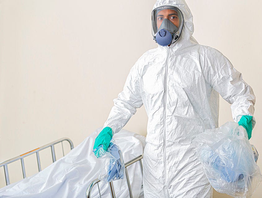 Hospital Worker Disposing of Contagious Materials