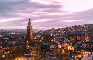 Cork, Ireland - April 12, 2014: St. Anne's in Shandon and the City of Cork photographed against a beautiful sunset at dusk.