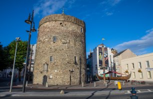 Waterford, Republic of Ireland - August 16th 2018: A view of Reginalds Tower and the Viking Longboat replica named Vadrarfjordr, in the historic city of Waterford, Republic of Ireland.
