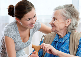 Smiling patient and carer.jpg