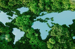 A lake in the shape of the world's continents in the middle of untouched nature. A metaphor for ecological travel, conservation, climate change, global warming and the fragility of nature.3d rendering